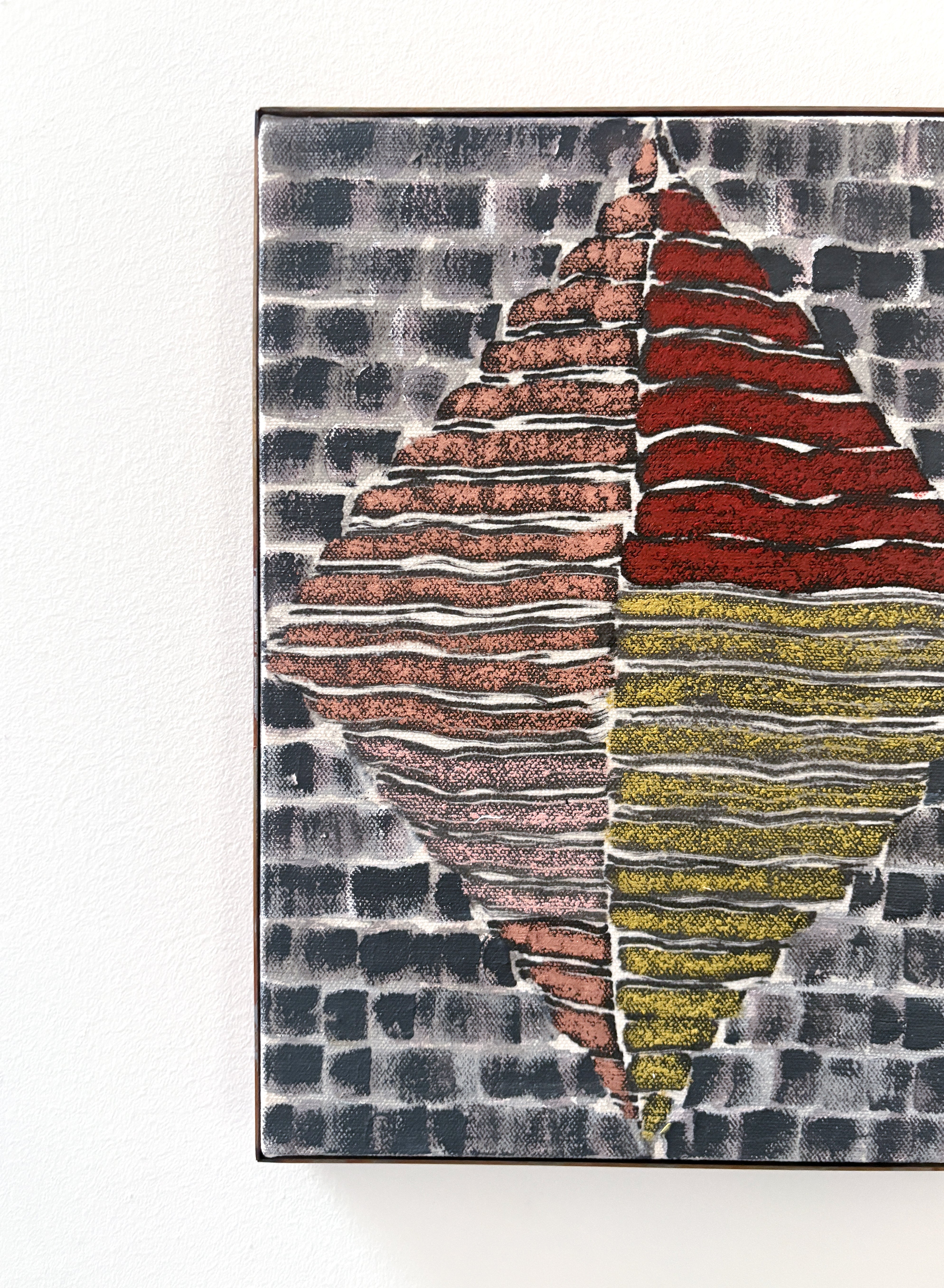 Abstract art piece with layered geometric shapes in red, yellow, and black on a textured background.