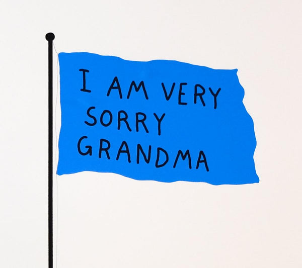 Blue flag on pole reads 'I AM VERY SORRY GRANDMA' in black text.